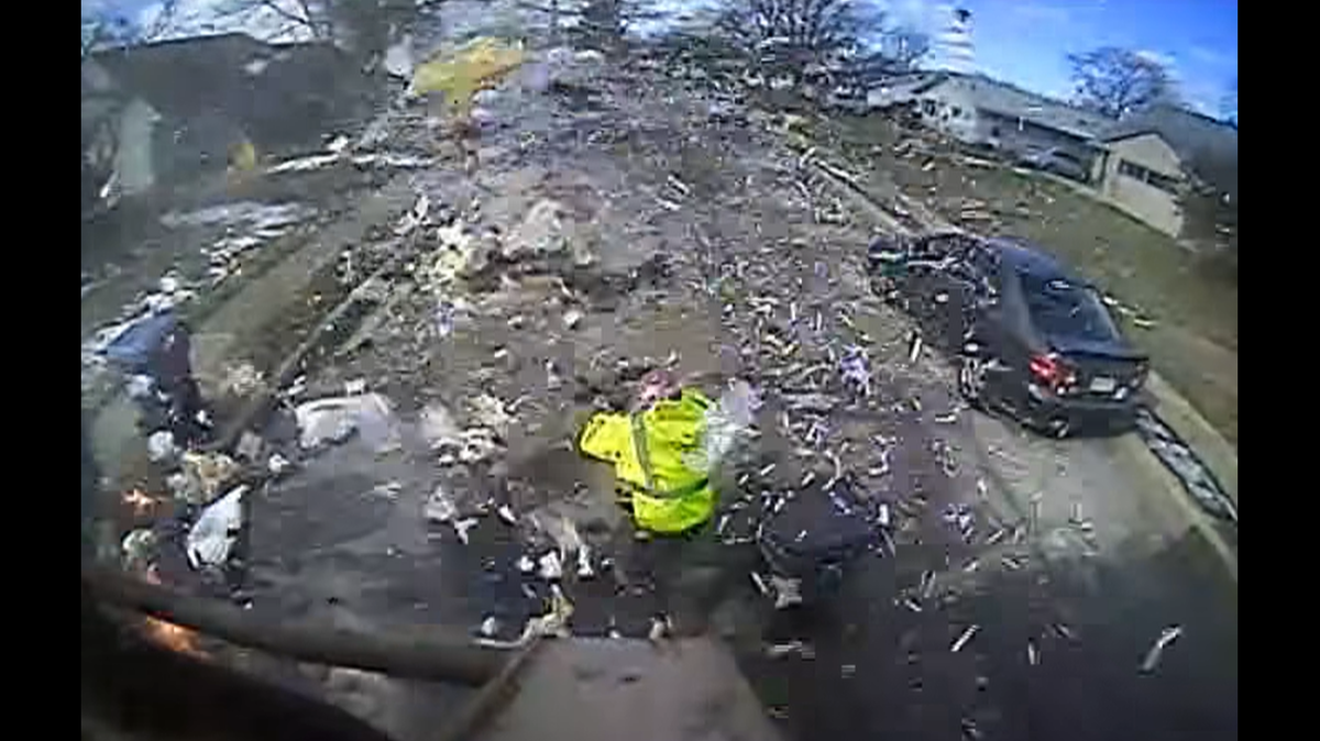 One worker was able to quickly extinguish a fire in the back of the truck, the video shows.