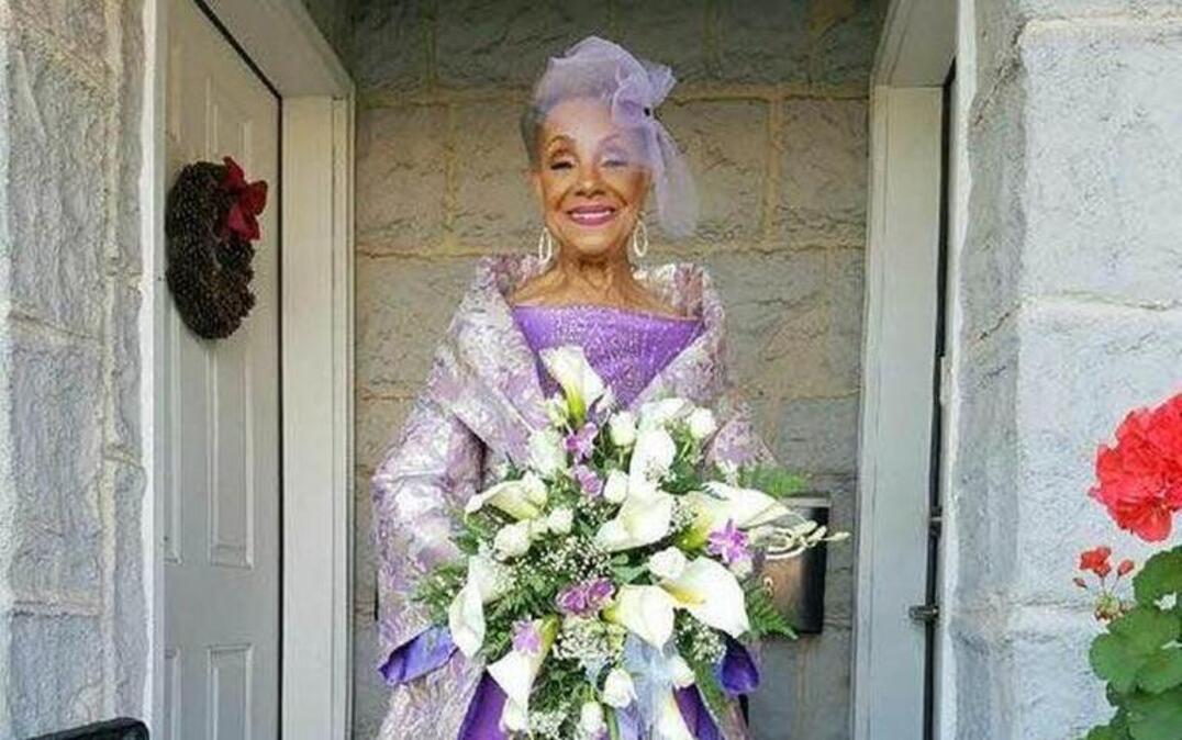 This photo of 86-year-old Millie Taylor-Morrison of New Jersey, in a purple wedding gown she designed herself, has turned her into a viral sensation.