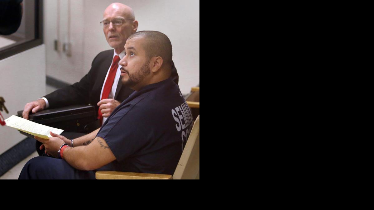 
George Zimmerman, right, sits with attorney Don West during a first appearance at the Seminole County Courthouse in Sanford, Fla.
