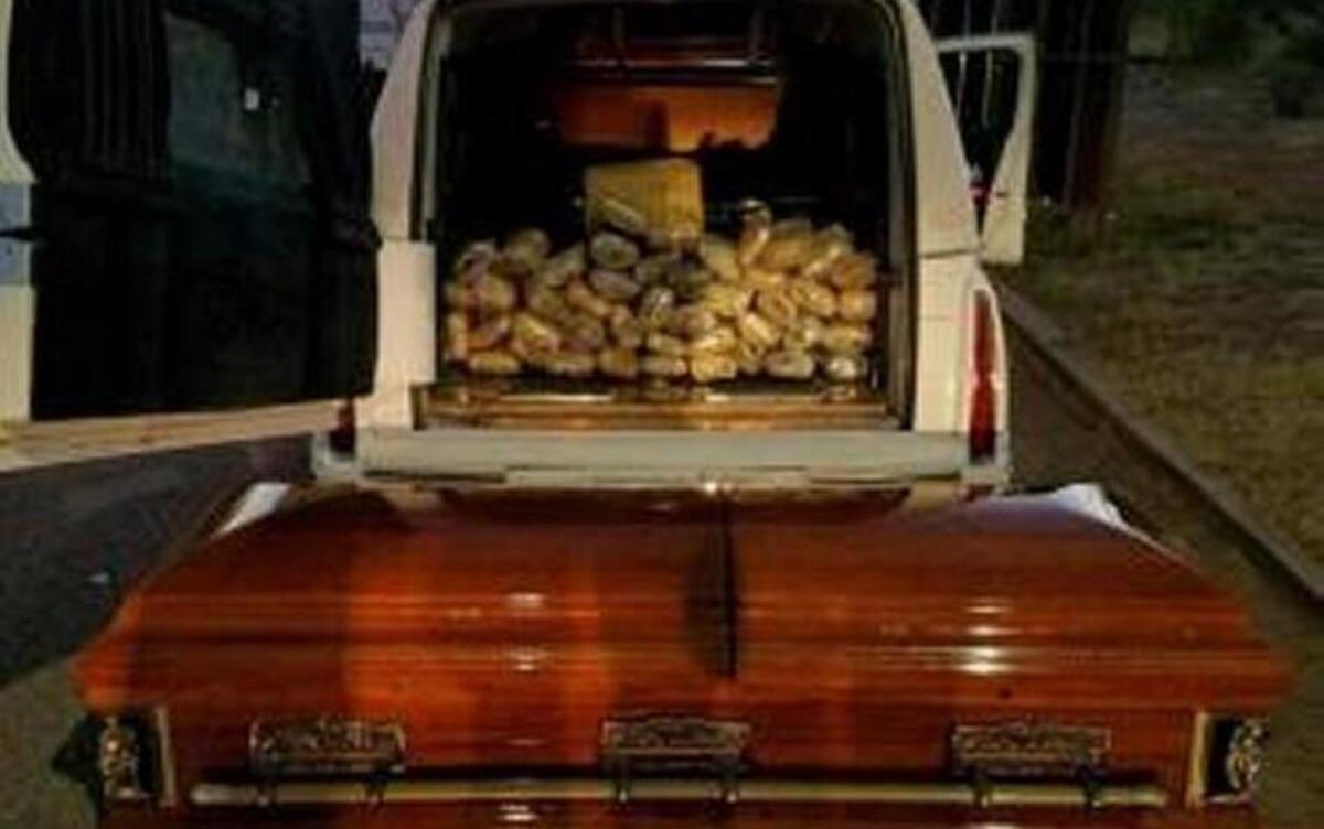 Border patrol agents found 67 pounds of marijuana hidden in a casket in a hearse they stopped near Tombstone, Ariz. on Saturday.