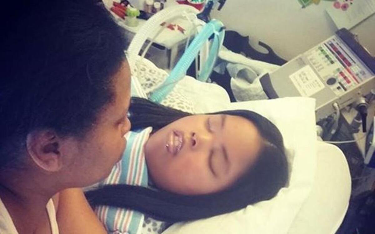 This photo of Jahi McMath and her mother, Nailah Winkfield, published on Facebook over the weekend stirred a lot of talk on social media.