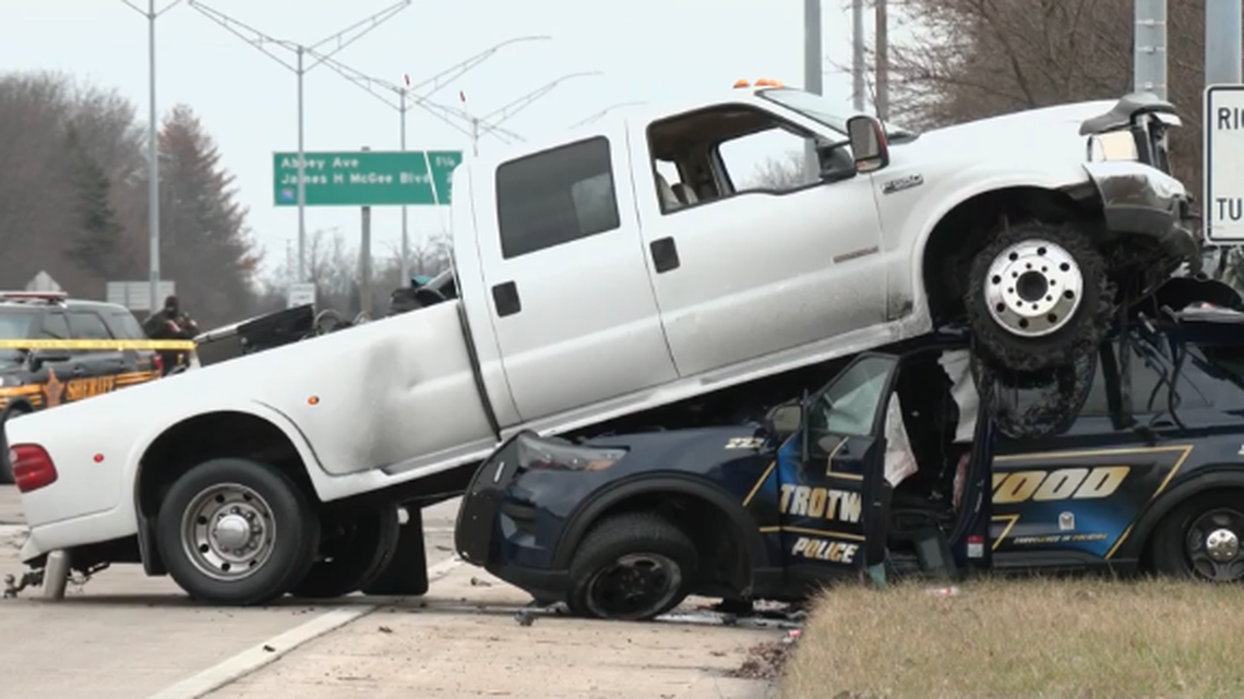 A Trotwood police cruiser was crushed by a pickup truck during a pursuit in the Dayton, Ohio, area.