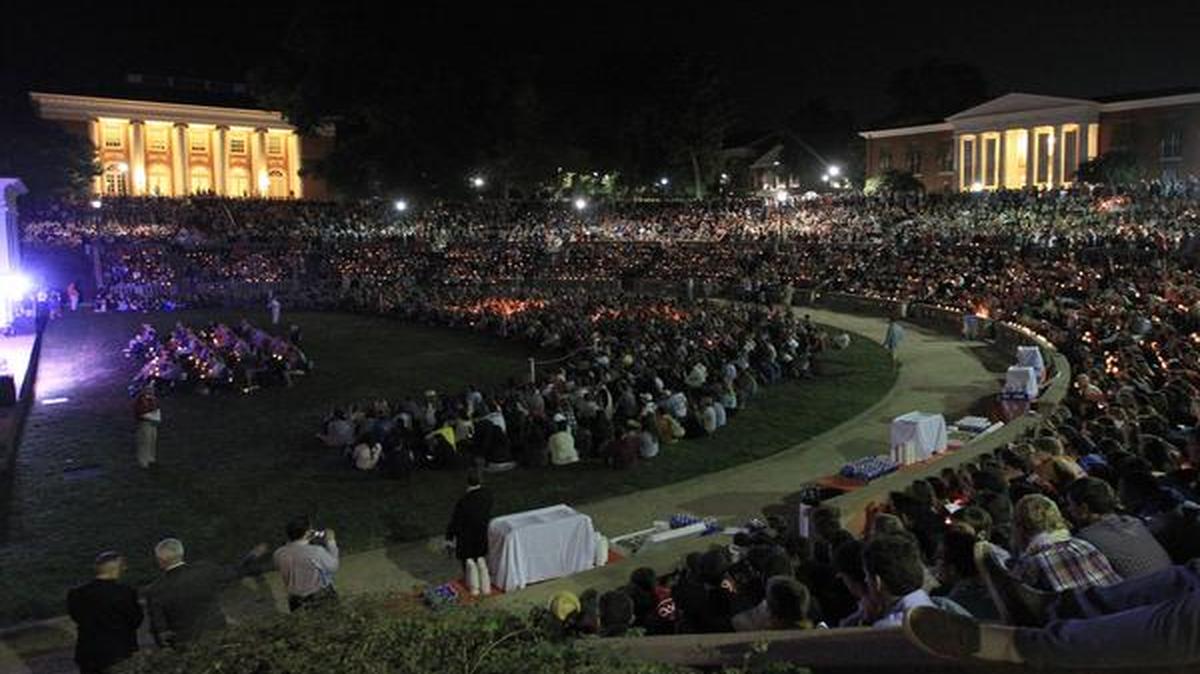 
Students attend a vigil for missing U.Va. student Hannah Elizabeth Graham Thursday night, Sept. 18, 2014, at the University of Virginia in Charlottesville, Va. 
