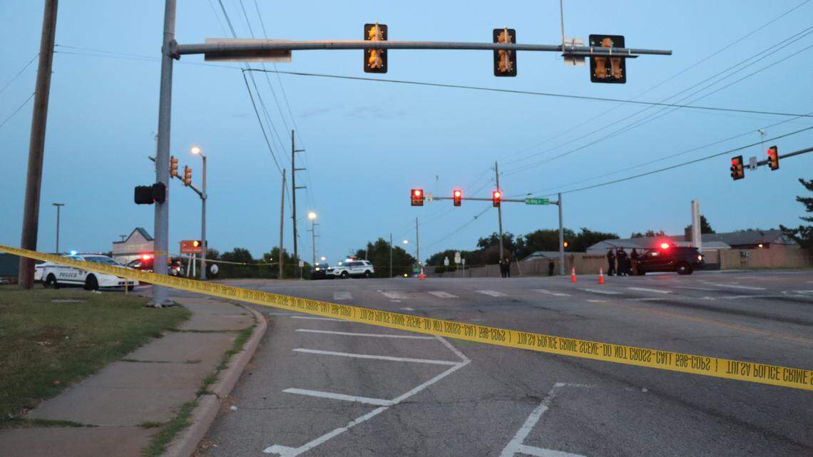 Officers respond to a shooting in Tulsa. A 19-year-old woman was shot in her stomach while in a car, police said.