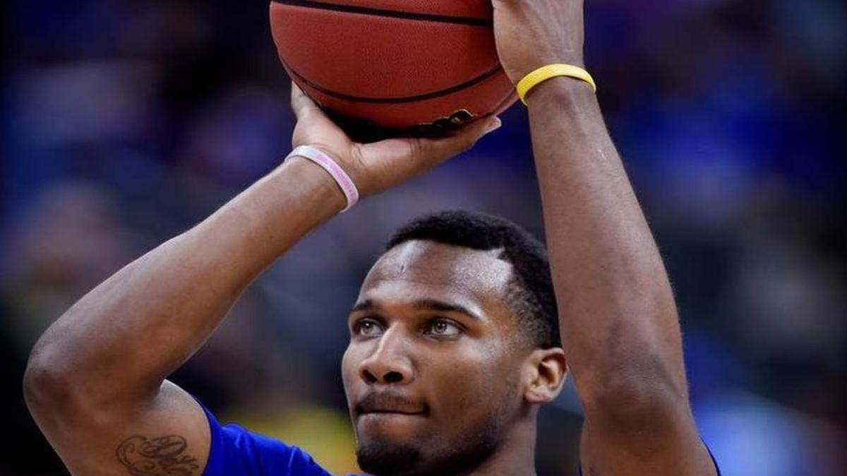 Kansas Jayhawks guard Wayne Selden’s pink wristband is a reminder of a friend he’s kept close for the last three years - 9-year-old Karis Selk of Topeka, who has brain cancer now in remission.