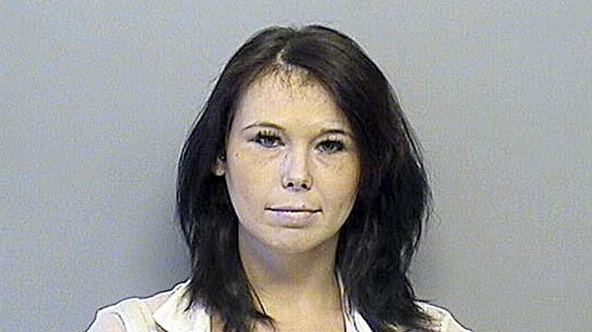 Shaynna Lauren Sims was convicted of slashing the corpse a woman she suspected of having an affair with her husband.