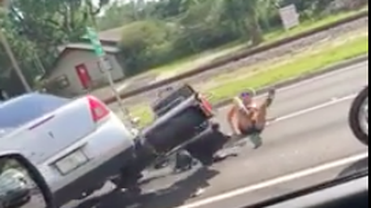 Video of a road rage incident in Florida on Monday has gone viral. The motorist who knocked over the motorcycle has been arrested.