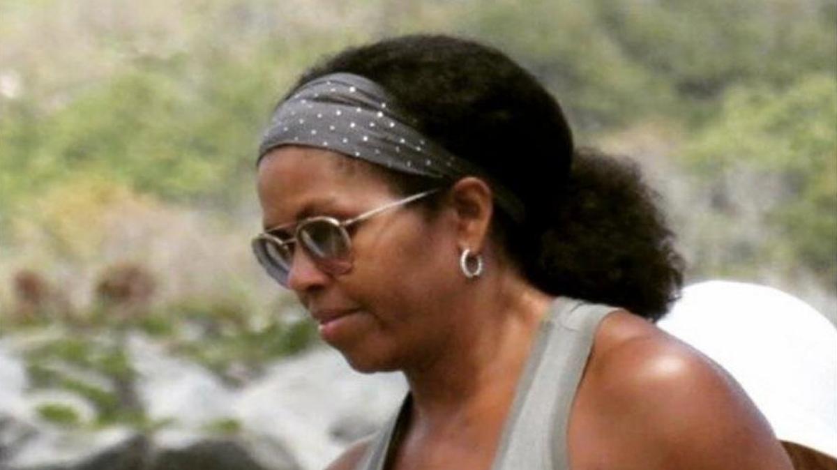 This undated photo of Michelle Obama wearing her hair natural found its way to Twitter on Sunday and launched hundreds of comments.