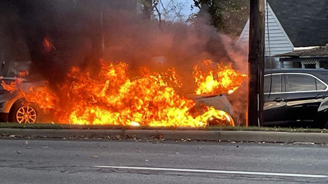 Downed power lines spark huge fire and set cars ablaze in Ohio car lot. See the photos.