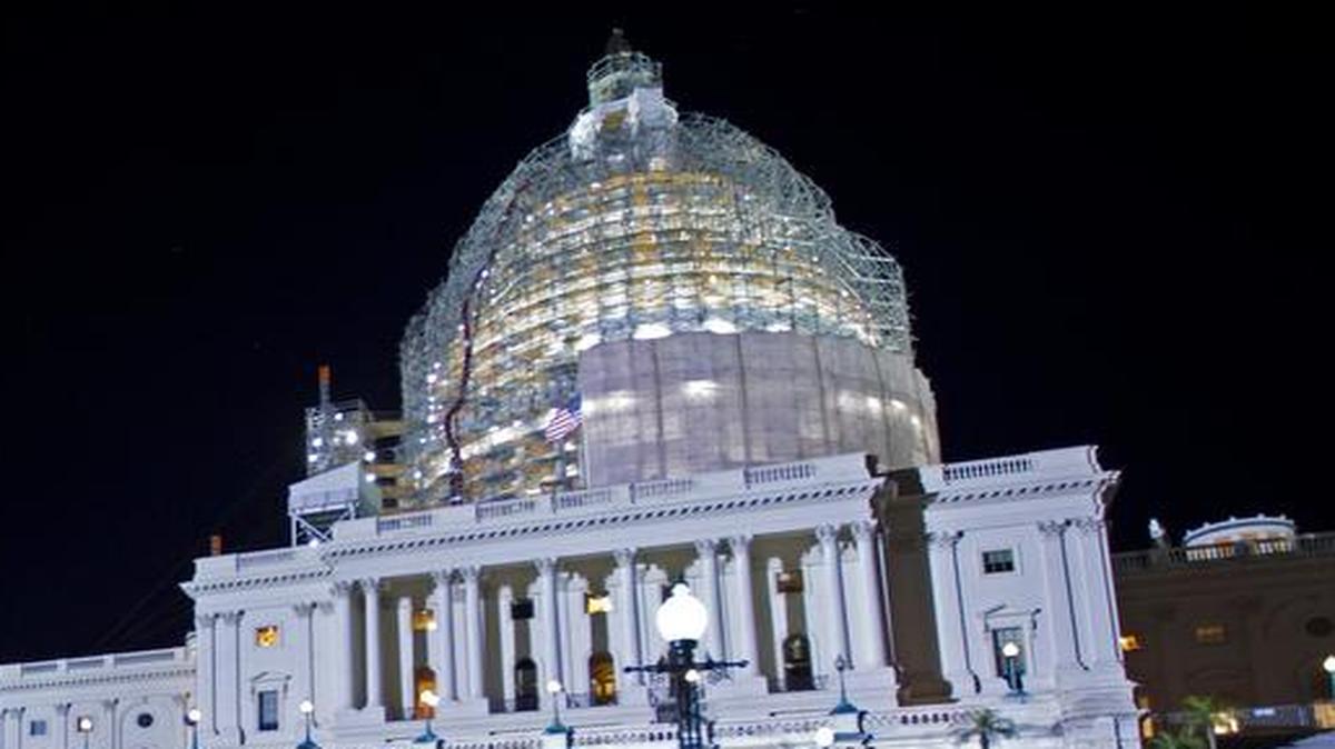
The U.S. Capitol is illuminated at night in this Friday, May 22, file photo. A U.S. Capitol Police spokeswoman said Sunday that a bomb squad safely destroyed a pressure cooker found in a “suspicious” vehicle left unattended near the Capitol building and that the vehicle’s owner had been arrested.
