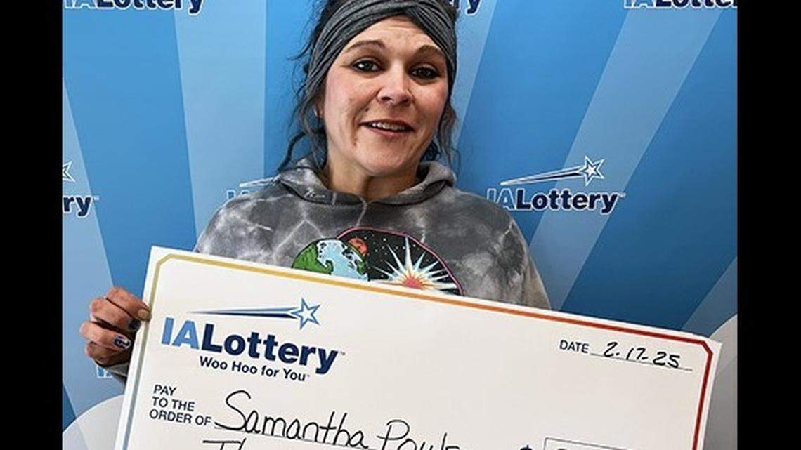 The woman won a top prize on a “$30,000 Crossword” lottery ticket.