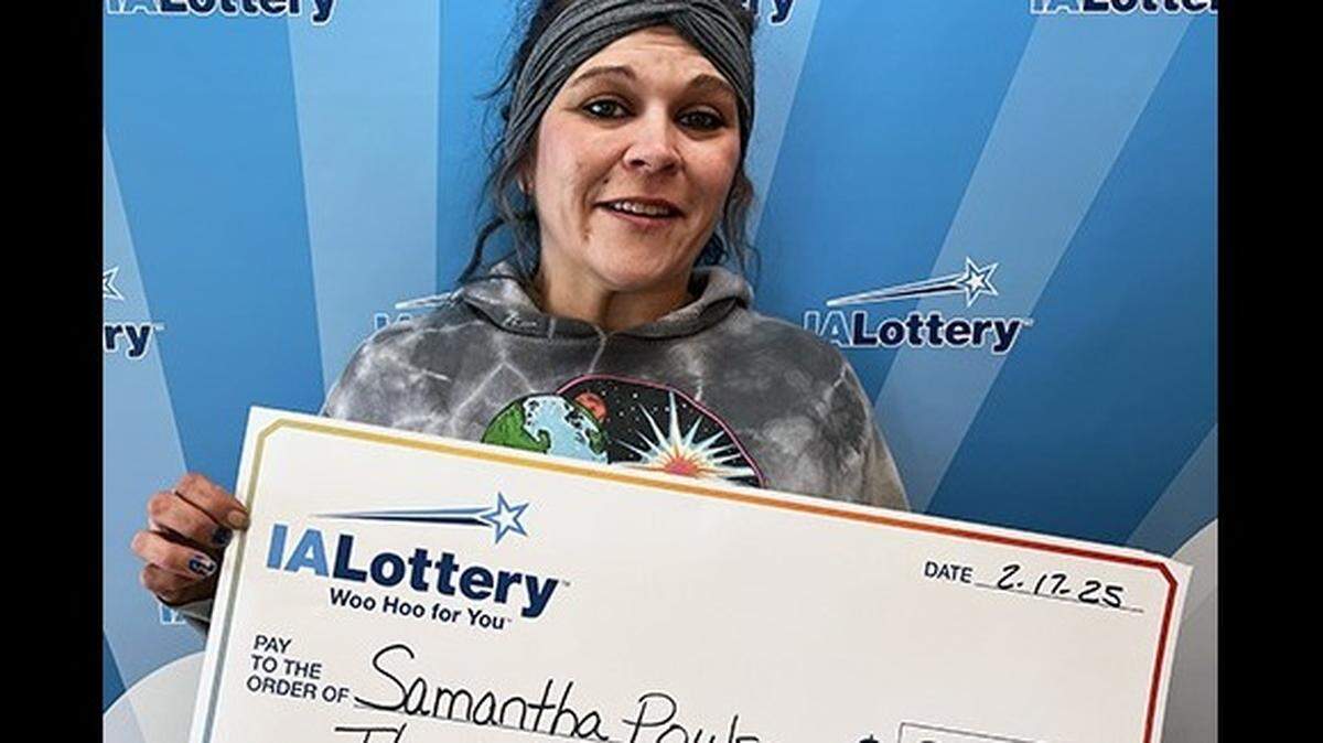 The woman won a top prize on a “$30,000 Crossword” lottery ticket.