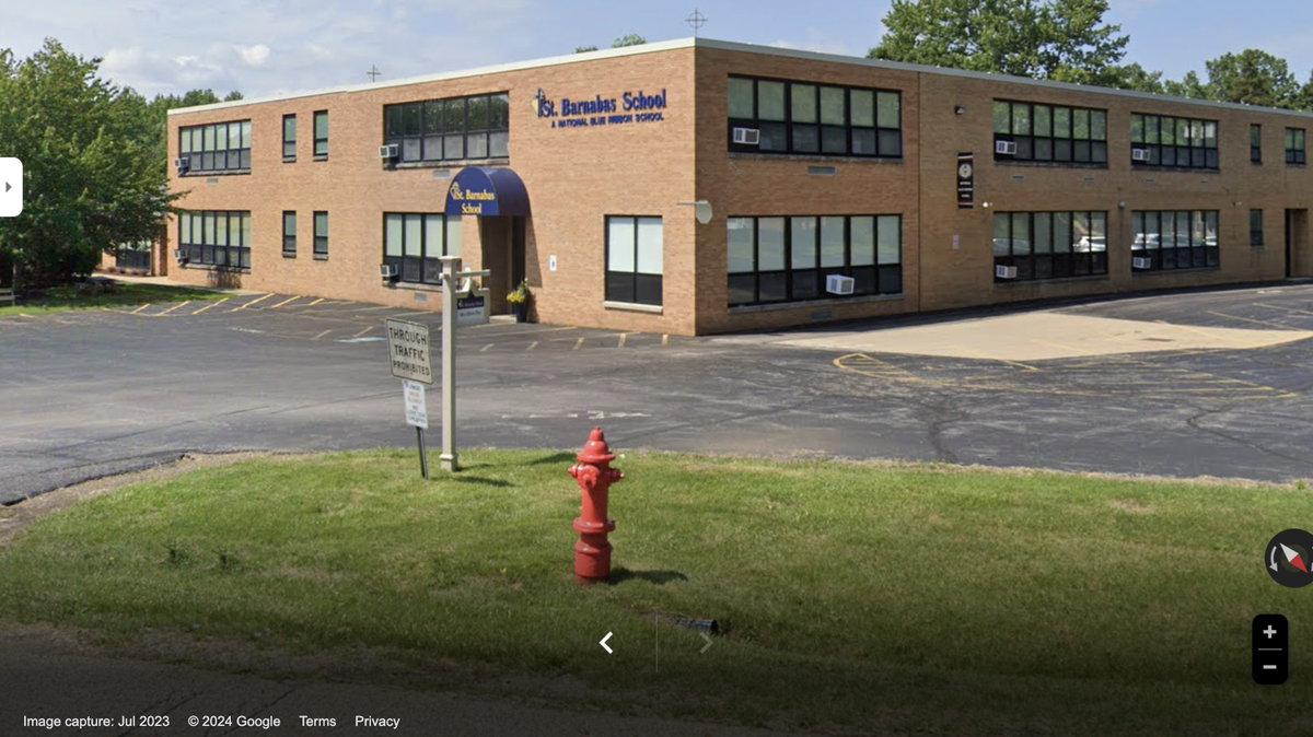 An 84-year-old woman was hit and killed outside St. Barnabas Catholic School, authorities said.