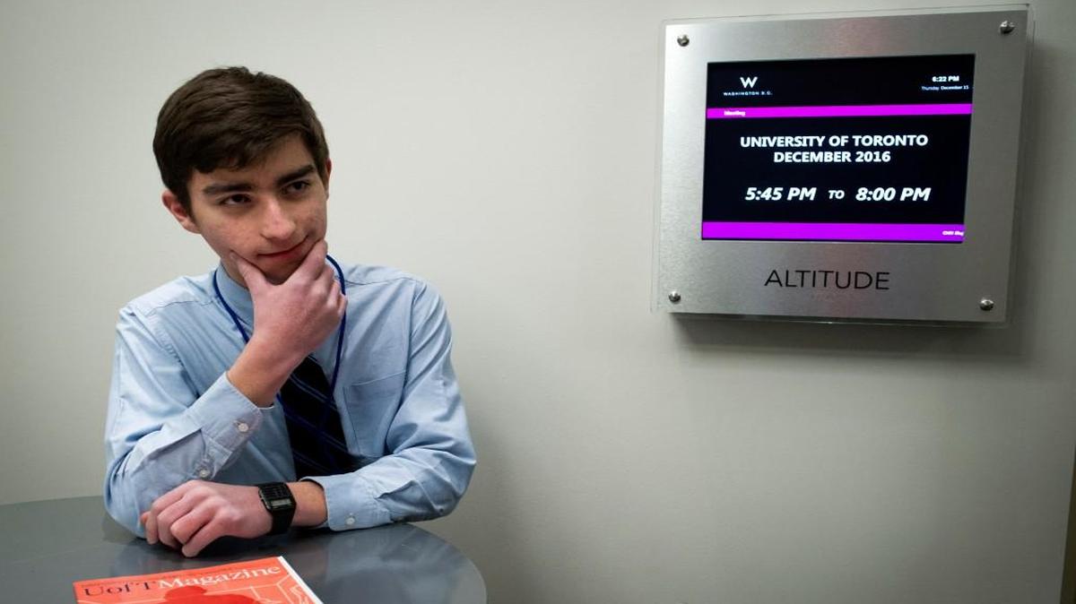 Milo Hartsoe of Great Falls. Va., a senior at Landon School in Bethesda, Md. attends a recruitment event by the University of Toronto, in Washington. In the wake of the presidential election, more U.S. students are thinking about going to college in Canada.