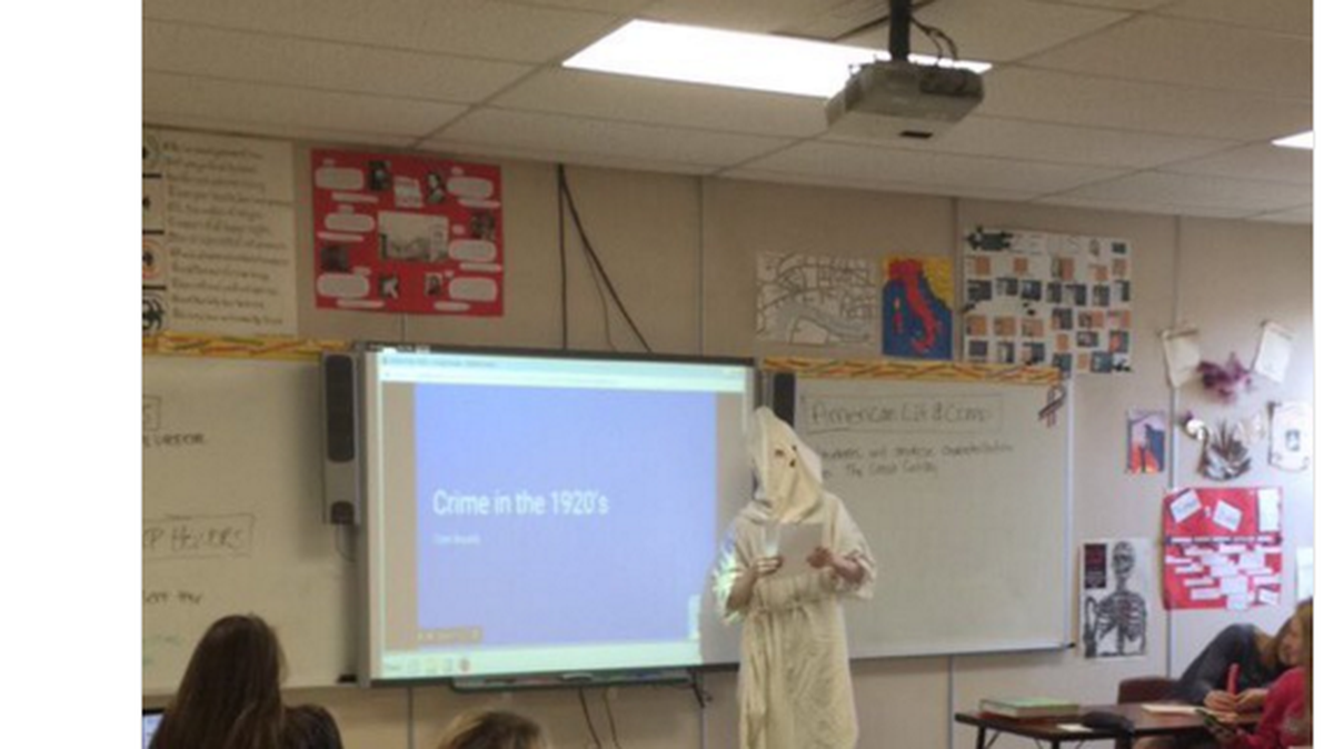 A high school student in Wisconsin sparked an uproar on Monday when he wore a Ku Klux Klan costume to deliver an English class presentation.