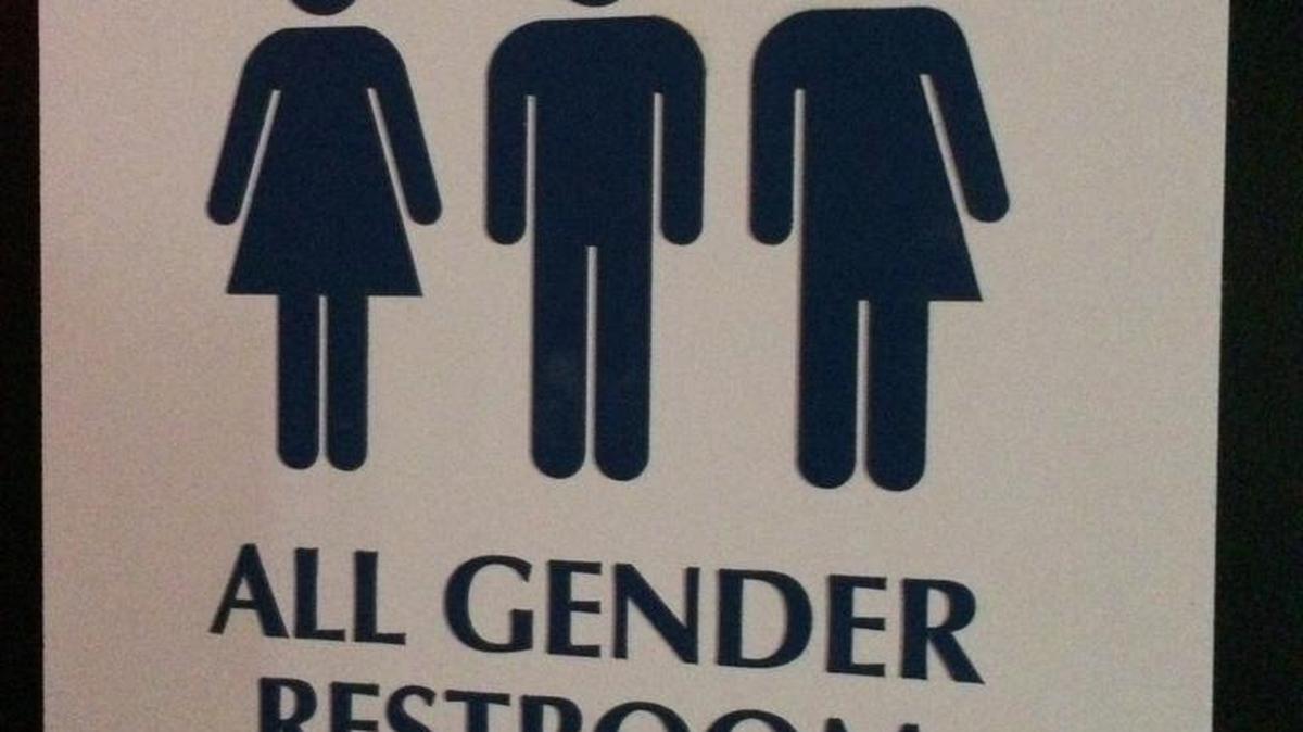 An “All Gender Restroom” sign outside a bathroom in a bar in Washington.