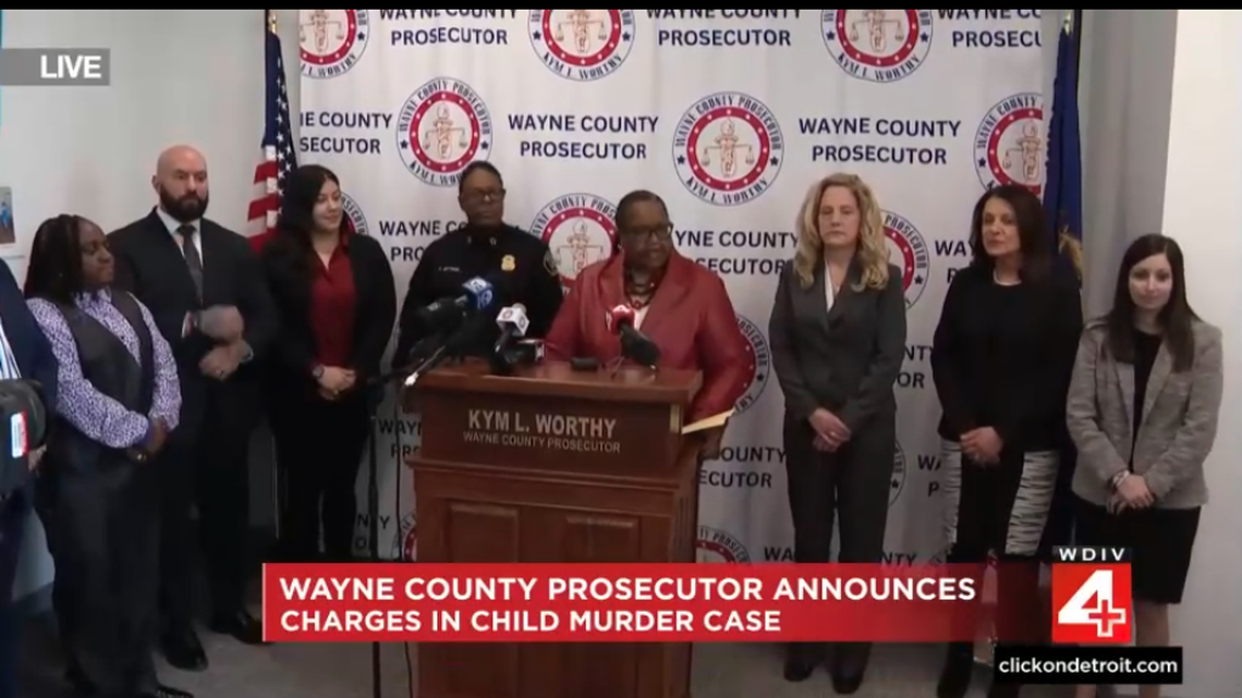 Wayne County Prosecutor Kym Worthy, center, announced charges Feb. 5 against a mom accused of killing her 9-year-old son.