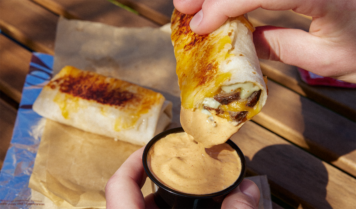 Taco Bell’s new cheesy dipping burritos are available in two varieties: grilled, marinated steak or chicken.