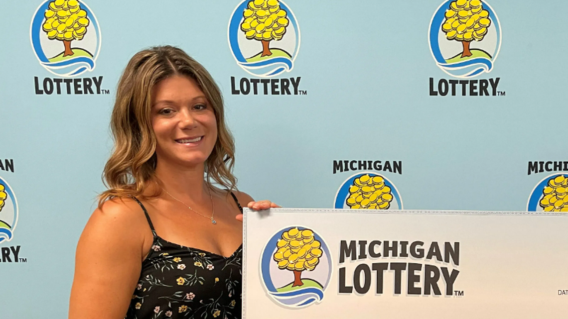 Shawna Foerster with her oversized check.