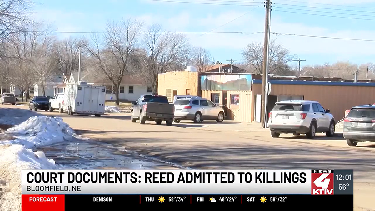 Two people have been arrested after Nebraska police say a man walked into a bowling alley with a shotgun and killed two men.