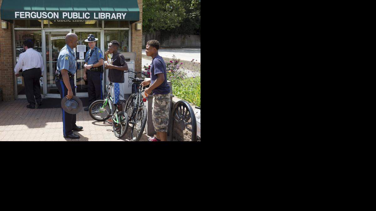 
A school program at the Ferguson Public Library was visited Thursday by Missouri Highway Patrol Capt. Ronald Johnson. 
