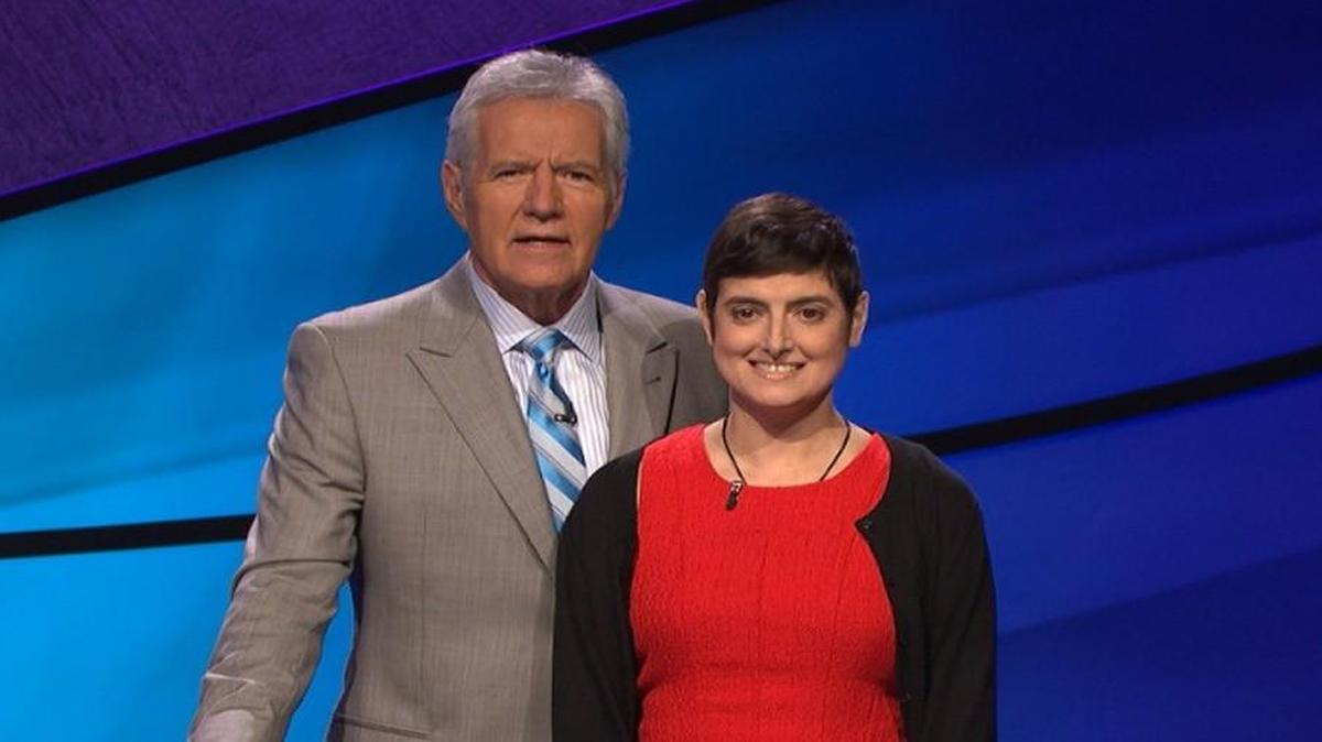 Only “Jeopardy!” host Alex Trebek, left, and a few staff members knew that contestant Cindy Stowell of Texas had cancer when she taped an episode in August.