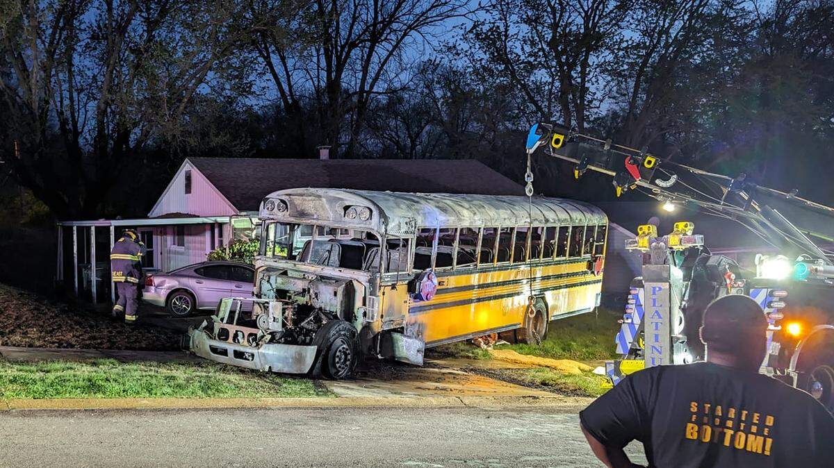 A school bus engulfed in flames crashed into a home in Normandy, Missouri, reports say.