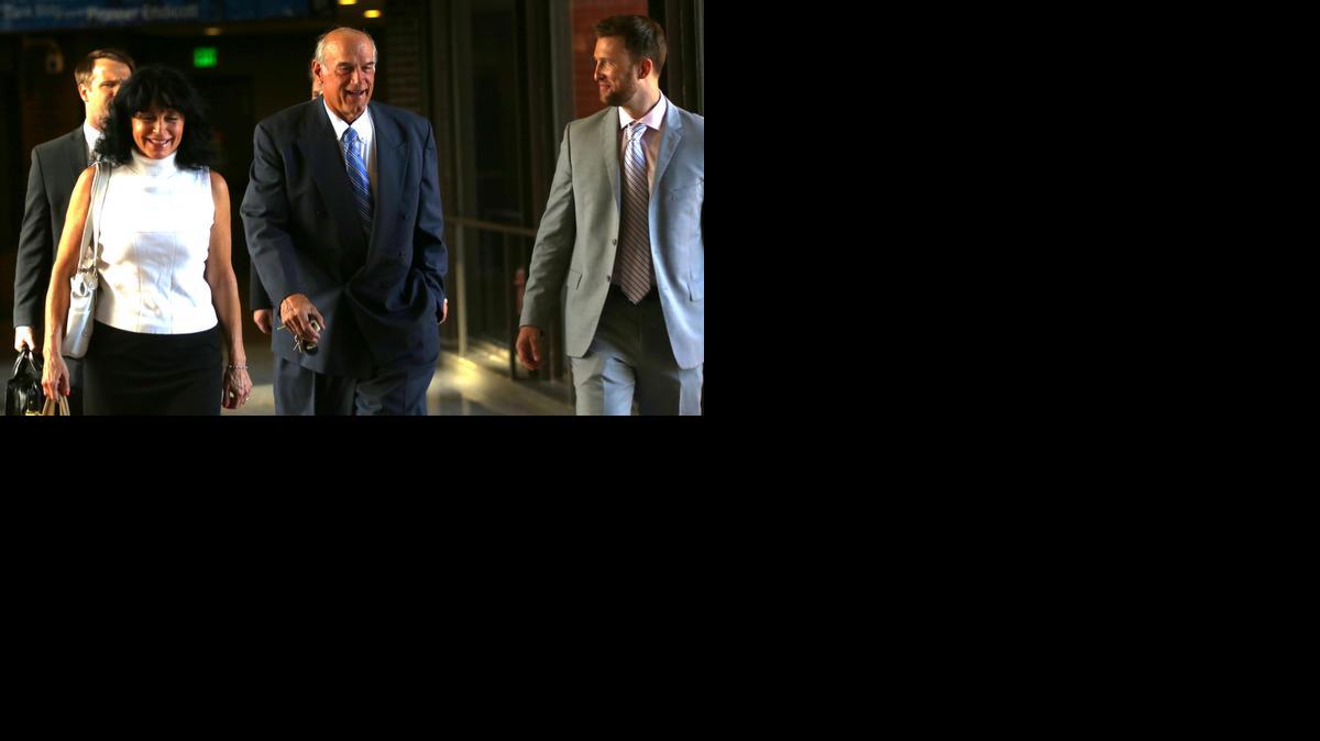 
Former Minnesota Gov. Jesse Ventura, center, arrives at court with his wife, Terry, and others for his defamation lawsuit against "American Sniper" author Chris Kyle in St. Paul, Minn.
