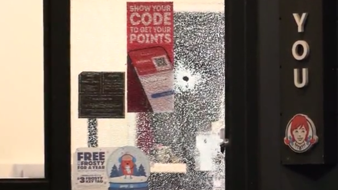 A Wendy’s worker was shot through a drive-thru window in Chicago, Illinois, police say.