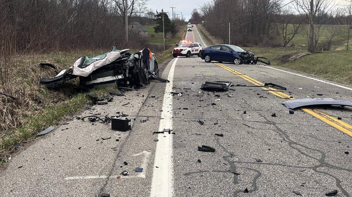 One car was left flattened after the crash.
