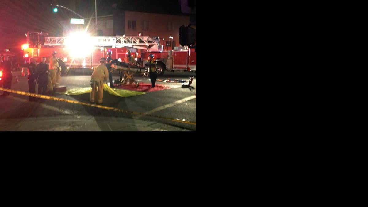 
Firefighters carry a victim from a triage area after a driver suspected of being intoxicated hit a group of pedestrians and another car outside a church as a Christmas service ended in the Los Angeles suburb of Redondo Beach, Calif.
