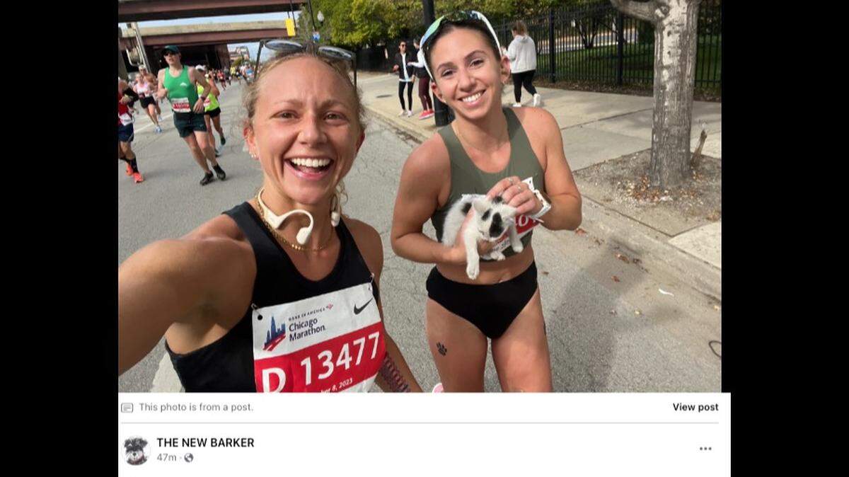 Sarah Bohan, right, rescued a stray kitten during the Chicago Marathon on Sunday, Oct. 8.