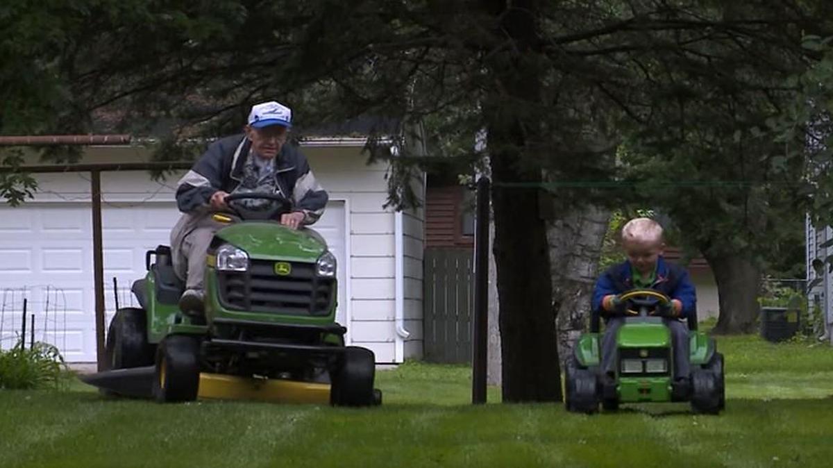 Emmett Rychner, 3, raced his best friend, Erling Kindem, in the summer of 2014 on their John Deere mowers.