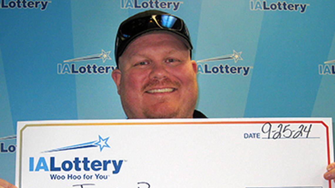 Jamie Bryson, of North Liberty, Iowa, won a $50,000 lottery prize while stopping to pick up a drink for his wife.