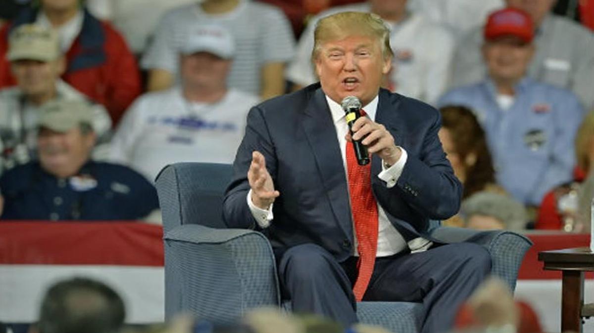 Fashion critics charge Donald Trump with this crime against style: His ties are too long.