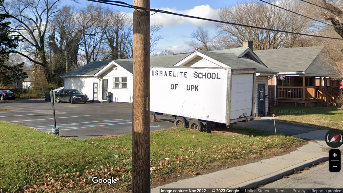 Police in Indiana have arrested a woman who they say admitted to purposely driving her car into a building she thought was an Israeli school.