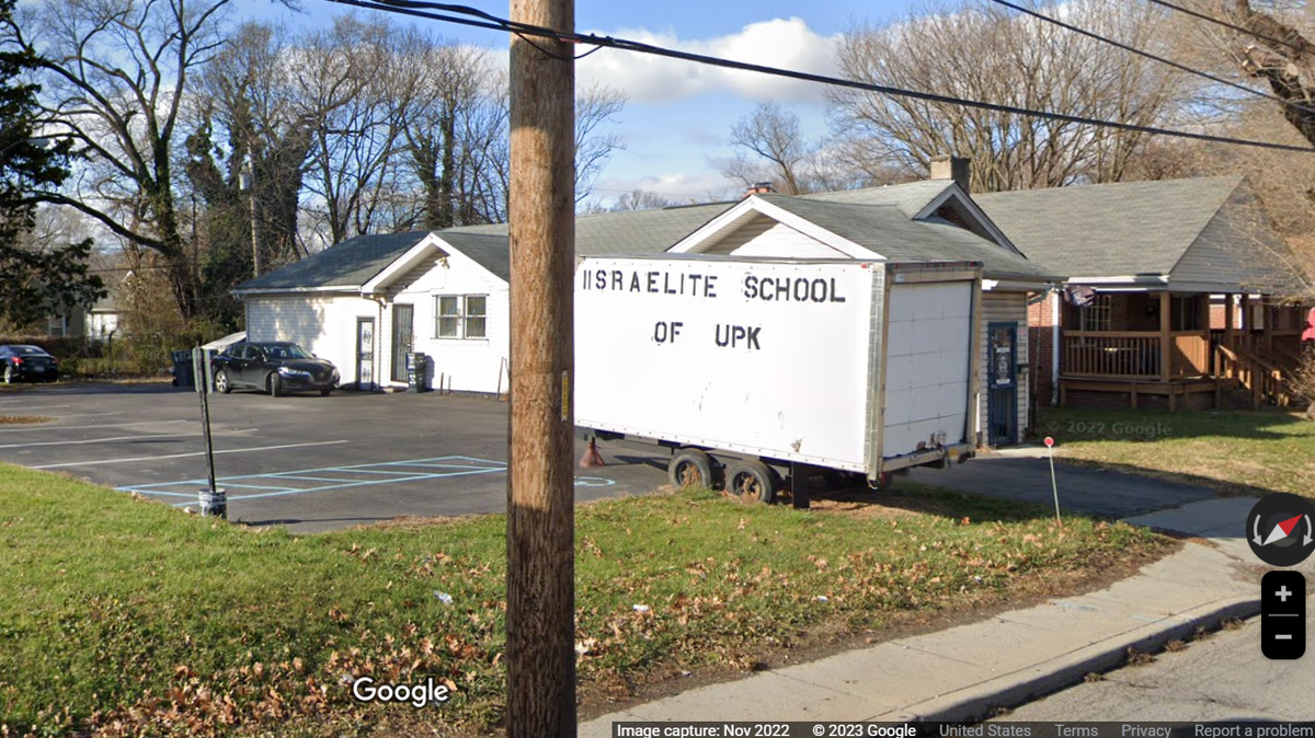Police in Indiana have arrested a woman who they say admitted to purposely driving her car into a building she thought was an Israeli school.
