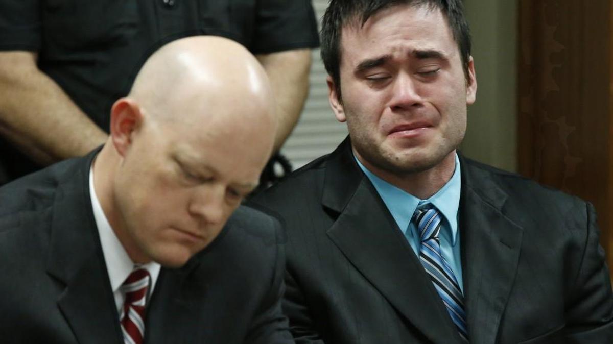 Daniel Holtzclaw, right, cries last December as the verdicts are read in his trial in Oklahoma City