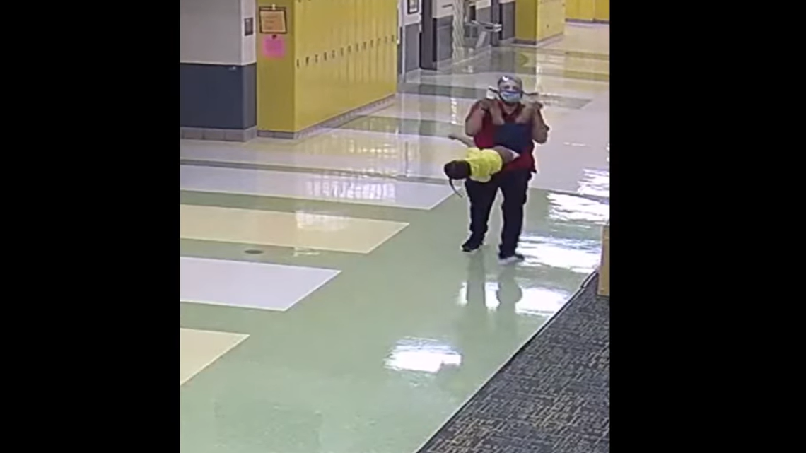 A Dayton Public Schools worker was fired after video showed him hitting a child.