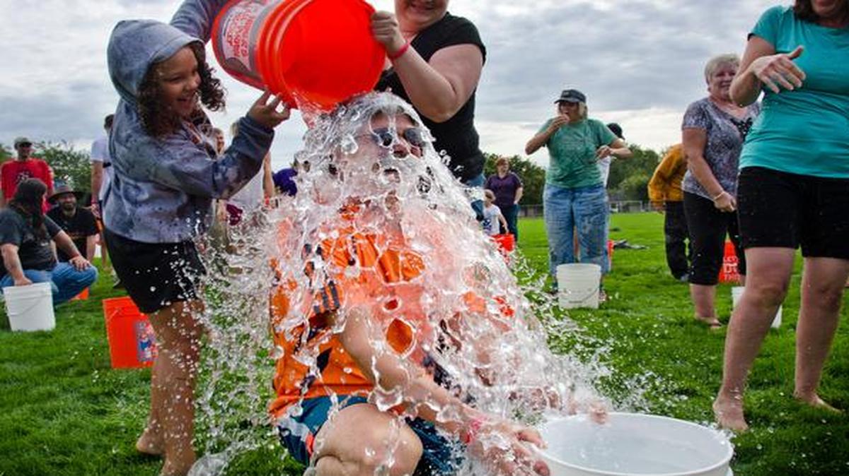 
Chas McKhann has ice water poured on himself during the Walla Walla Grand Ice Bucket Challenge in Walla Walla, Wash. 
