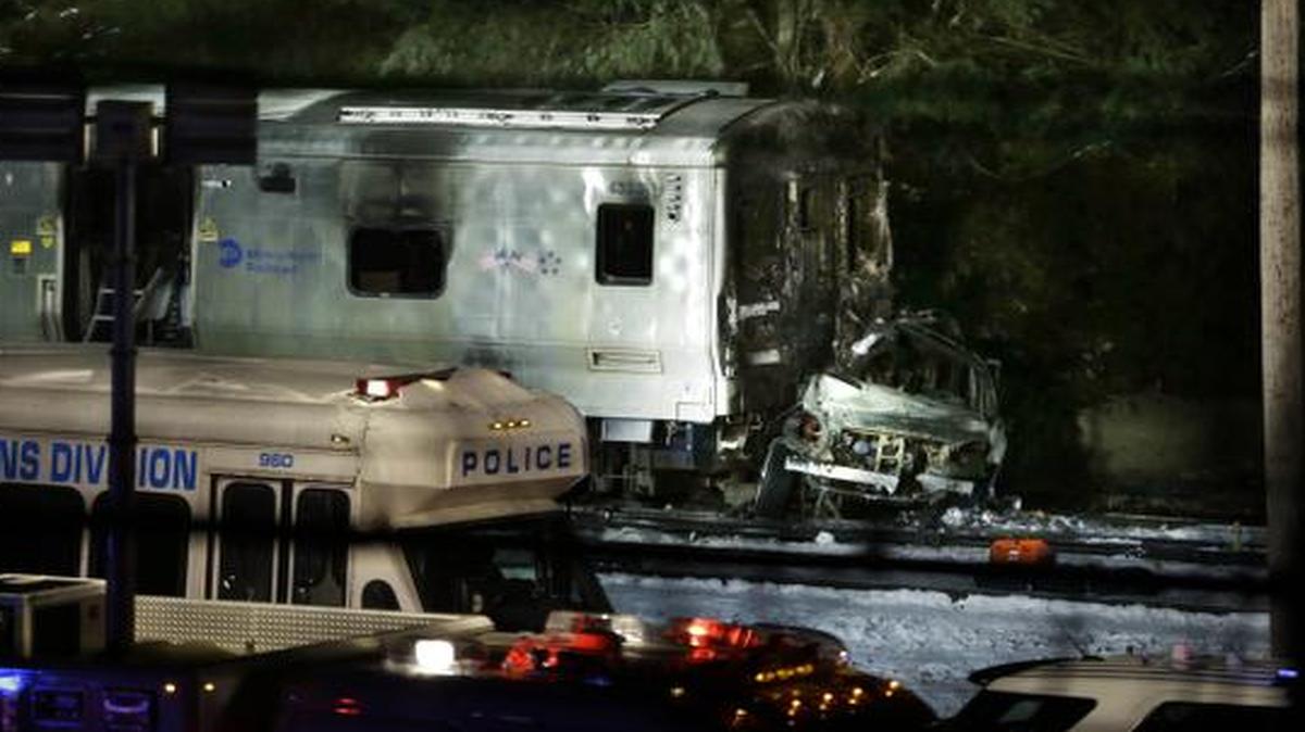 
The wreckage of a car remains smashed against the front of a train in Valhalla, N.Y.
