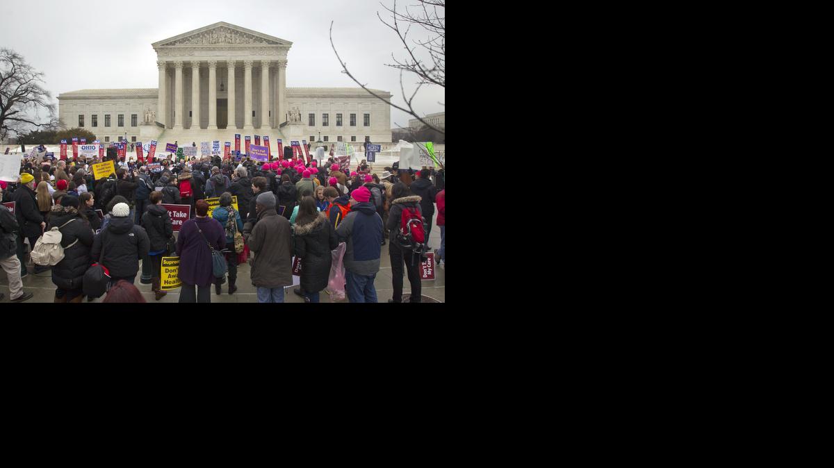 
A crowd gathers outside the Supreme Court last week in Washington
