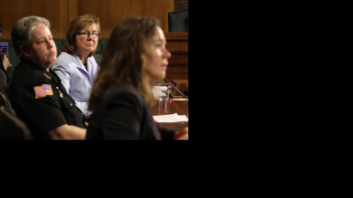 
Peg Langhammer, Executive Director, Day One in Rhode Island, center, and Police Chief Kathy Zoner, left, listen as Angela Fleischer, assistant director of Student Support and Intervention for Confidential Advising at the Southern Oregon University, right, testifies on Capitol Hill in Washington, Tuesday.
