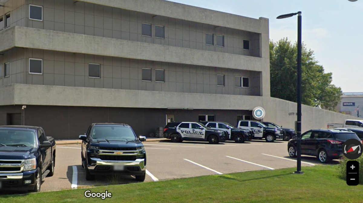 A man is suing a Wisconsin city after he says police officers held him and three children at gunpoint during a traffic stop.