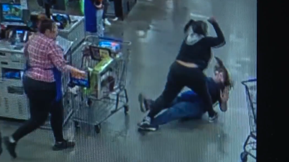 A Kroger worker was knocked unconscious by a customer at a Michigan store, police say.
