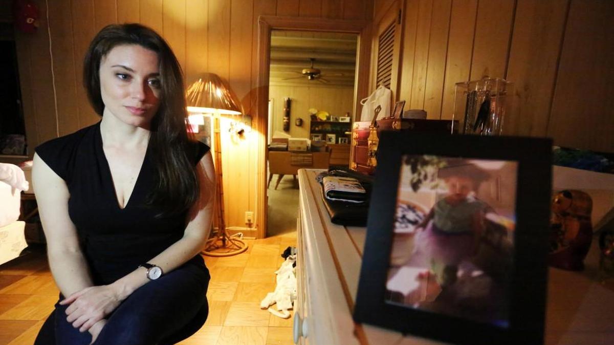 Casey Anthony next to a photo of her daughter, Caylee, in her West Palm Beach, Fla., bedroom.