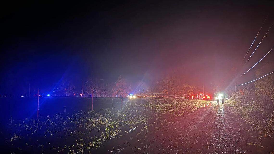 A father and son died in Oklahoma after jumping in floodwaters to rescue a family member, officials said.