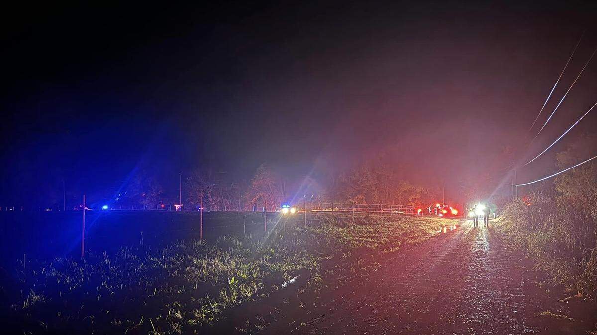 A father and son died in Oklahoma after jumping in floodwaters to rescue a family member, officials said.