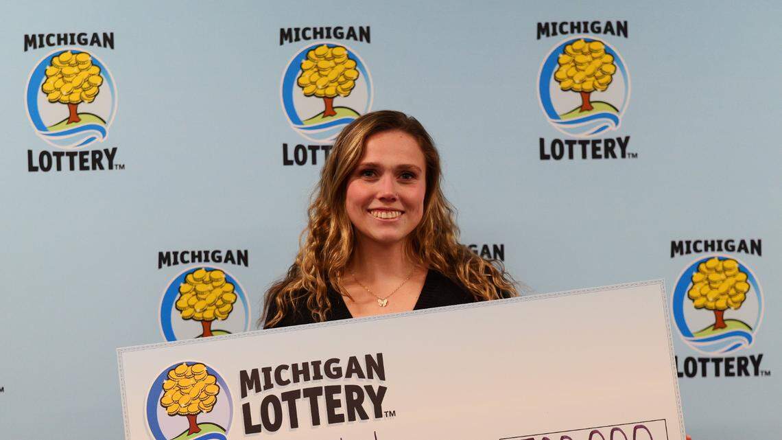 A woman from Indiana won a $500,000 lottery prize in Michigan after a white elephant gift exchange.