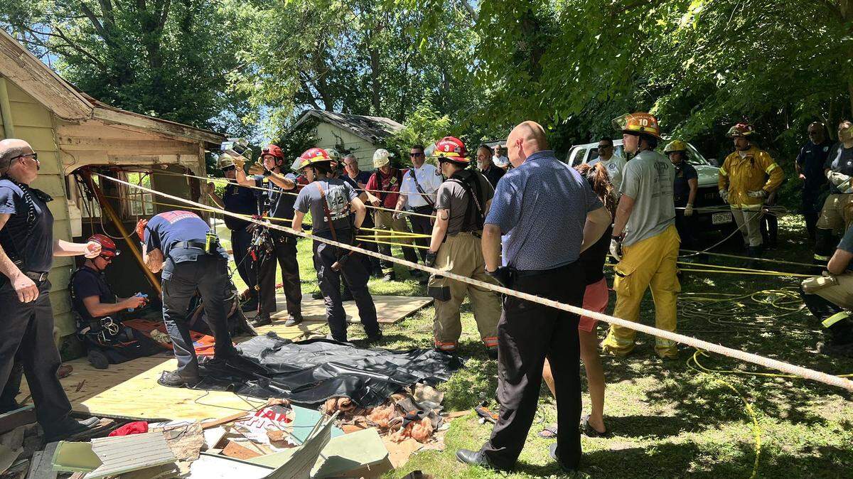 The construction worker was found dead in the water-filled cistern of the home, authorities say.
